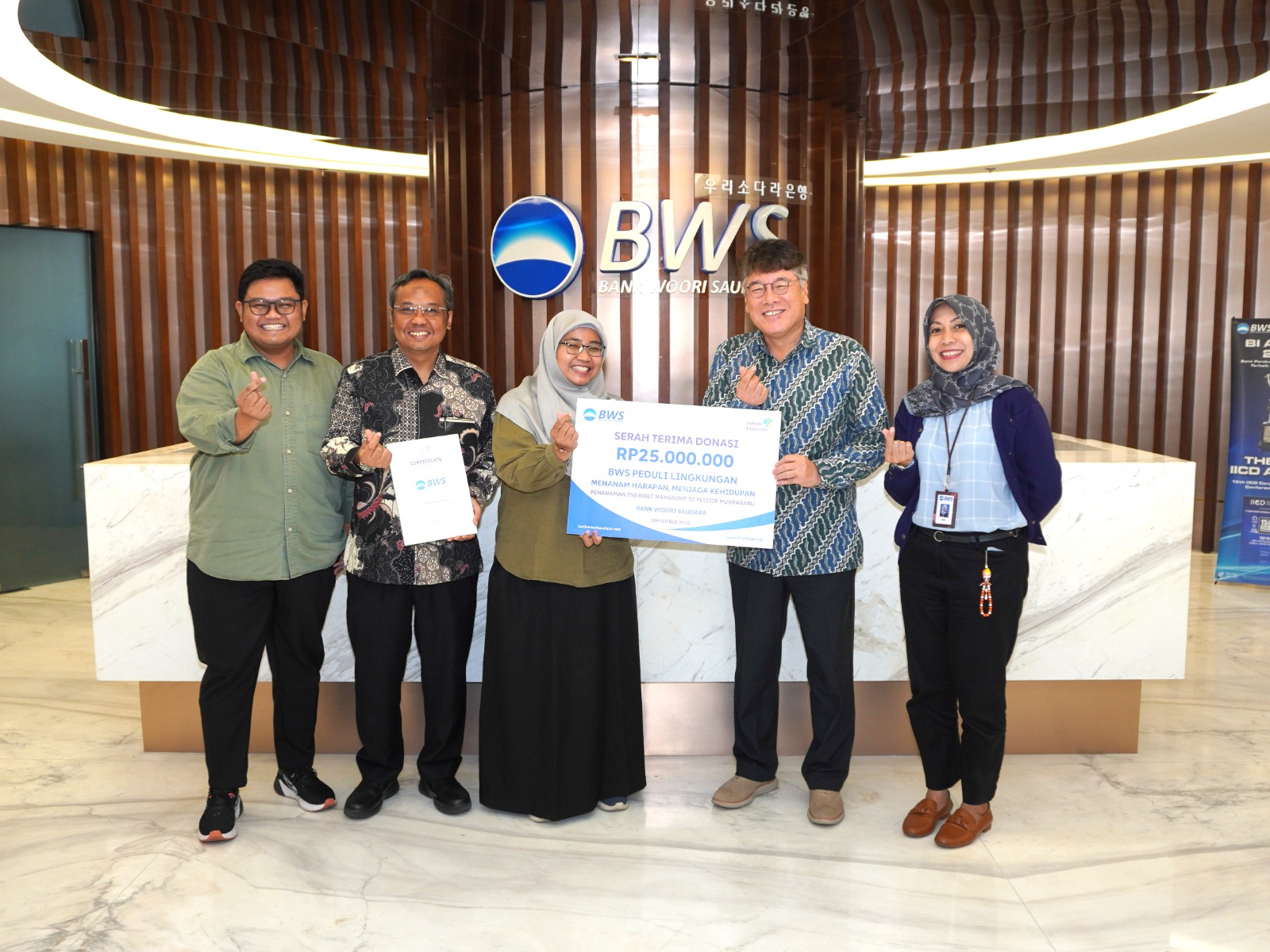 Menanam Harapan, Menjaga Kehidupan: Kolaborasi Sukses Filantropi & Bank Woori Saudara